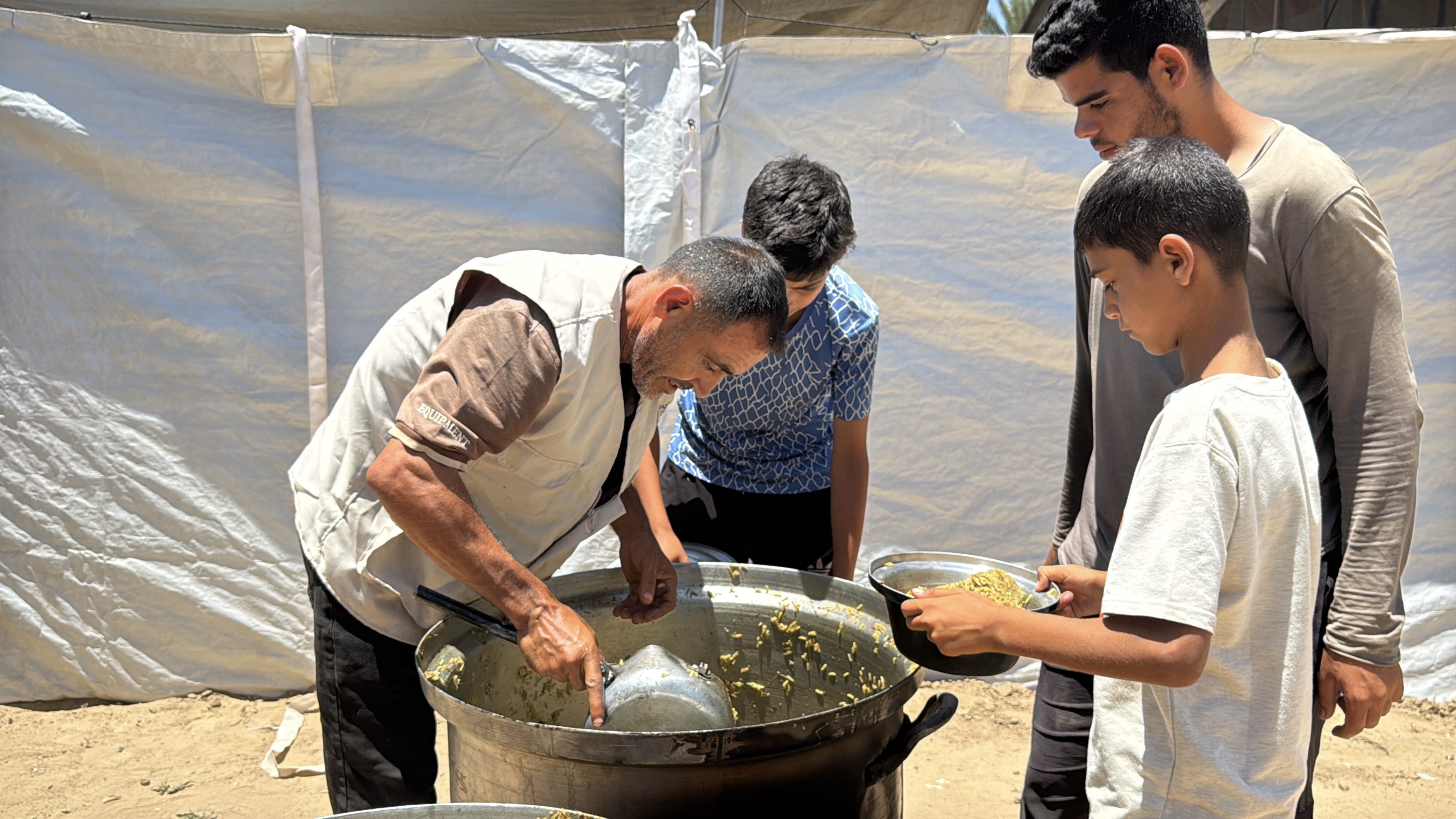 Nazya Humanitarian Aid food aid distribution for Palestinian families | delivering groceries, bread and essential food supplies to people in need in Palestine