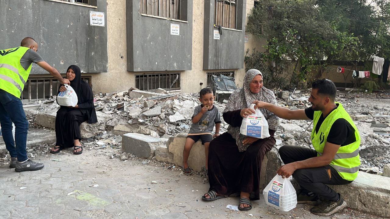 Nazya Humanitarian Aid food aid distribution for Palestinian families | delivering groceries, bread and essential food supplies to people in need in Palestine