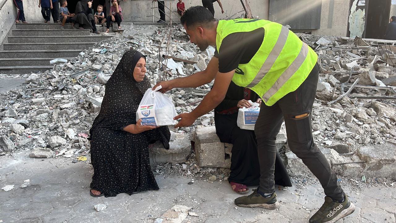 Nazya Humanitarian Aid food aid distribution for Palestinian families | delivering groceries, bread and essential food supplies to people in need in Palestine